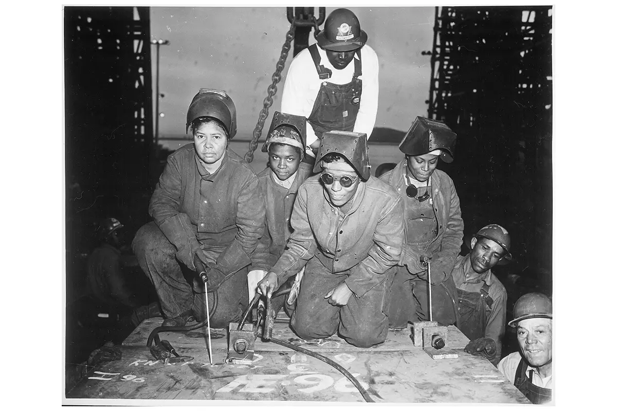 Shipyard welders working on wartime naval production