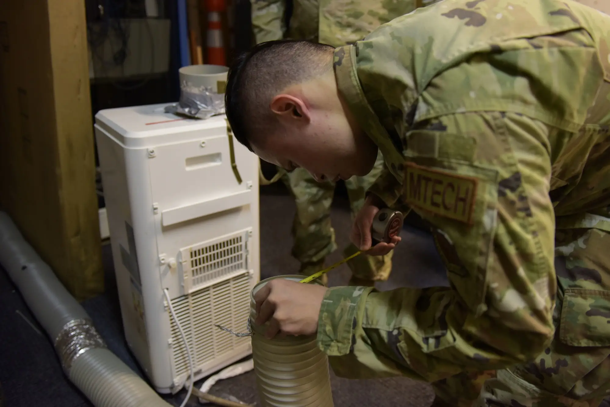 U.S. Air Force maintenance team using additive manufacturing to restore equipment